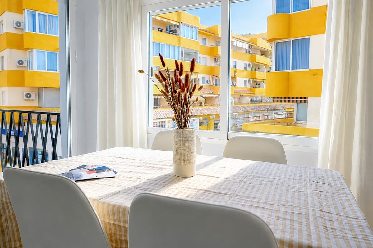 Dining area bathed in Mediterranean light
