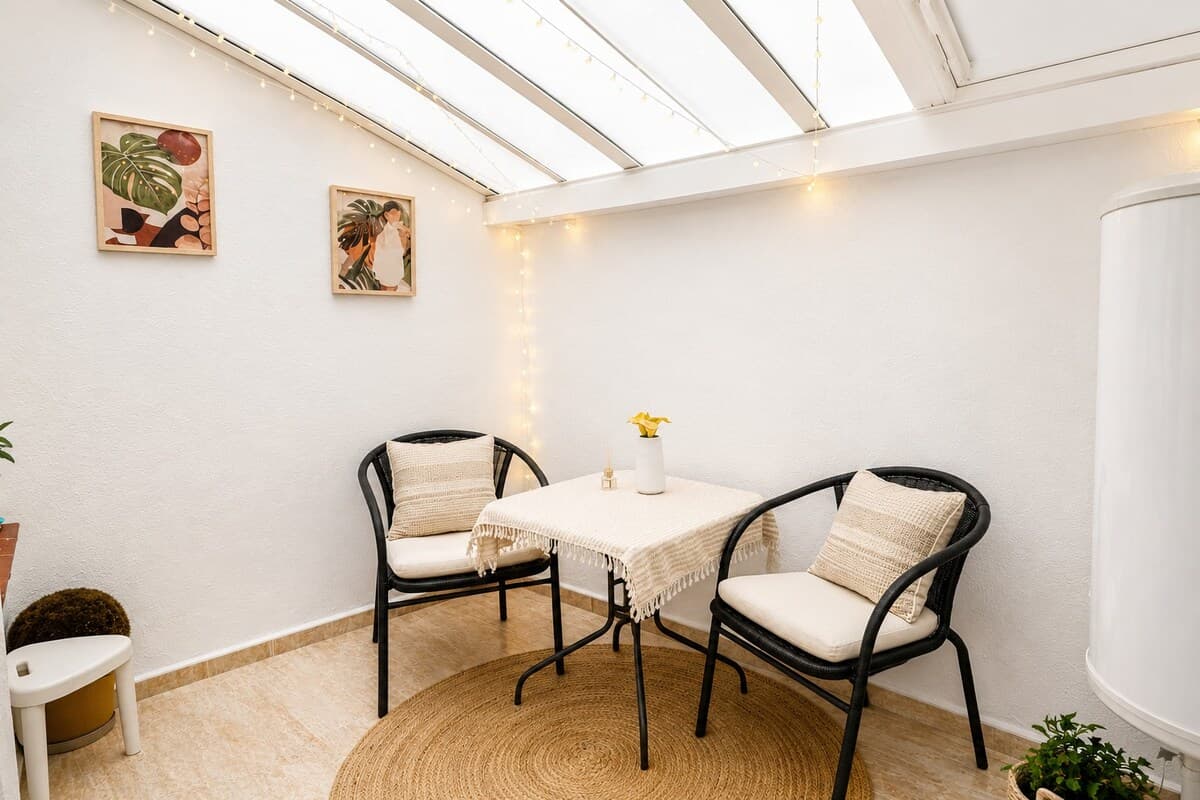 Sunny bistro corner under the skylight
